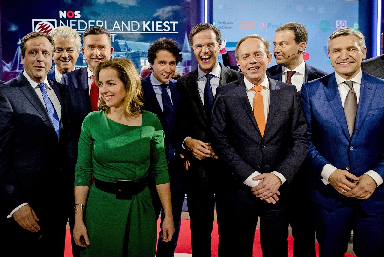 Democrats 66 party leader Alexander Pechtold, right-wing populist leader Geert Wilders, Socialist Party leader Emile Roemer, Party for the Animals' Marianne Thieme, Green Left party leader Jesse Klaver, Dutch Prime Minister Mark Rutte, Gert-Jan Segers of the Christian Union, Labour Party leader Lodewijk Asscher, and Christan Democrats party leader Sybrand Buma, from left, pose for a picture after the closing debate at parliament in The Hague, Netherlands, Tuesday, March 14, 2017. Amid unprecedented international attention, the Dutch go to the polls Wednesday in a parliamentary election that is seen as a bellwether for the future of populism in a year of crucial votes in Europe. (Robin van Lonkhuijsen ANP POOL via AP)